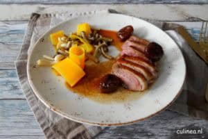 Eendenborst met vijgen, pompoentagliatelle en paddenstoelen