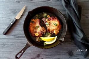 Ribkarbonade met knoflook en salie